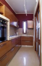 <strong>cucina angolare, essenza e marmo </strong> <br> Design Cucine